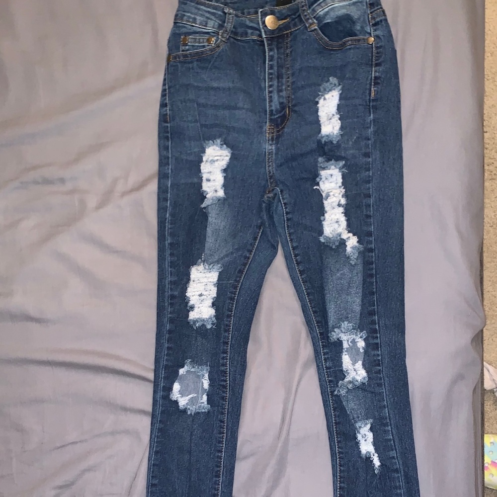 Distressed fashion nova skinny jeans
